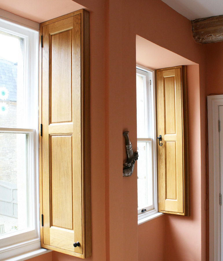 charlie-caffyn-designs-oak-shutters-that-foldaway-into-oak-cabinets
